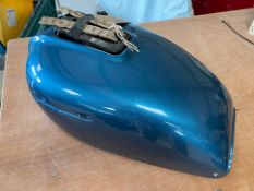 A restored fuel tank for a Honda CB 550F.