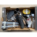 A box of Norton Dominator parts.