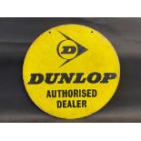 A Dunlop Authorised Dealer circular double sided enamel sign, 18" diameter.
