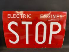 A rectangular red and white enamel sign - 'Electric Engines Stop', 36 x 24".