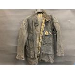 A Johnsons motorcycle wax jacket, size M, plus a pair of Belstaff Trialmaster wax trousers.