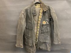 A Johnsons motorcycle wax jacket, size M, plus a pair of Belstaff Trialmaster wax trousers.