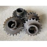 Eight Manx Norton engine sprockets.