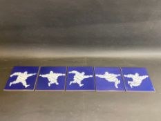 A set of five Michelin dealership frieze tiles.
