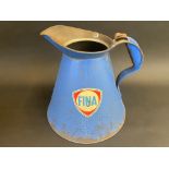 A large Fina gallon measure with wide neck, dated March 1945.