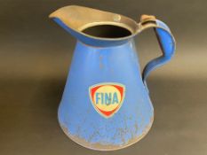 A large Fina gallon measure with wide neck, dated March 1945.