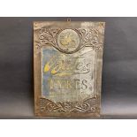 A Bates Tyres embossed tin advertising sign, 10 x 14".