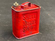 A Shell Motor Spirit perfume can in the form of a petrol can.