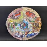 An unusual boxed BP circular motoring themed jigsaw puzzle depicting Stirling Moss to the centre,