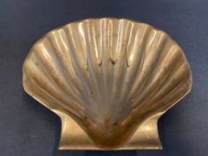 A polished brass Shell 'clam-shaped' dish/ashtray.