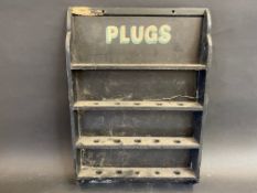 A 'Plugs' wooden advertising garage display board sign, 14 1/2 x 20 3/4".