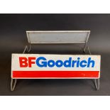 A B.F. Goodrich tyre display stand with advertising sign to both sides.