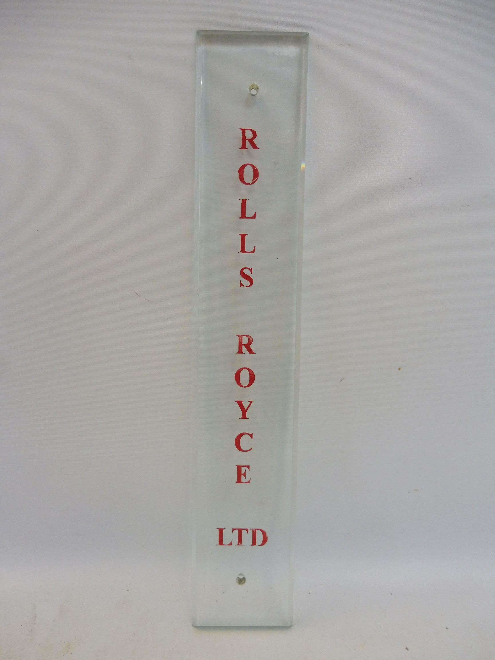 A rare Rolls-Royce Ltd glass finger/door plate advertising sign, 2 3/4 x 15 1/4".