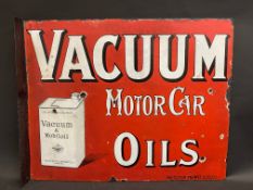 A Vacuum Motor Car Oils double sided enamel sign with hanging flange and the rare early version of
