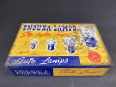 An Endura Lamps rectangular tin with full contents.