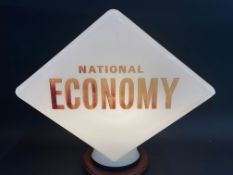 A National Economy lozenge shaped glass petrol pump globe, indistinctly stamped 'British Made'