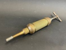 A brass Tecalemit Modal T.26 grease gun in good condition.