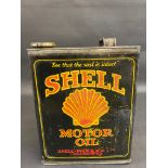 A Shell Motor Oil gallon can with original cap.
