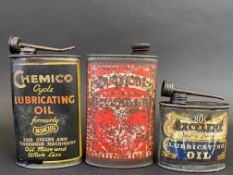 A Chemico Cycle Lubricating Oil oval can, a Searchlight oval can and an Excelene Lubricating Oil