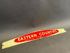 An Eastern Counties enamel notice board header sign, 22 1/2 x 3 1/4".