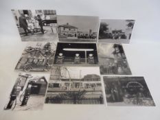 A selection of reprinted photographs of old garages, some bearing a label from the Shell