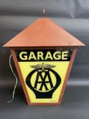 An AA Garage lantern shaped illuminated hanging lightbox by Franco.