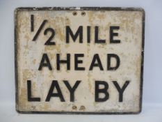 A rectangular road sign - 1/2 mile ahead Lay By, 24 x 19 3/4".