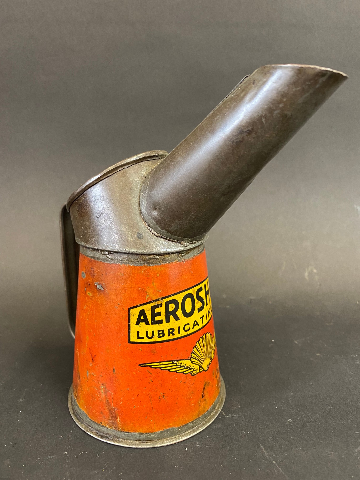 A rare Aeroshell Lubricating oil half pint measure, dated 1932, unusually stamped to the handle '3