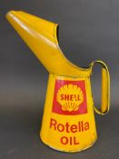 A Shell Rotella Oil quart measure in good condition, dated 1952.