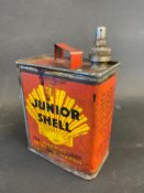 A Junior Shell lighter fuel can.