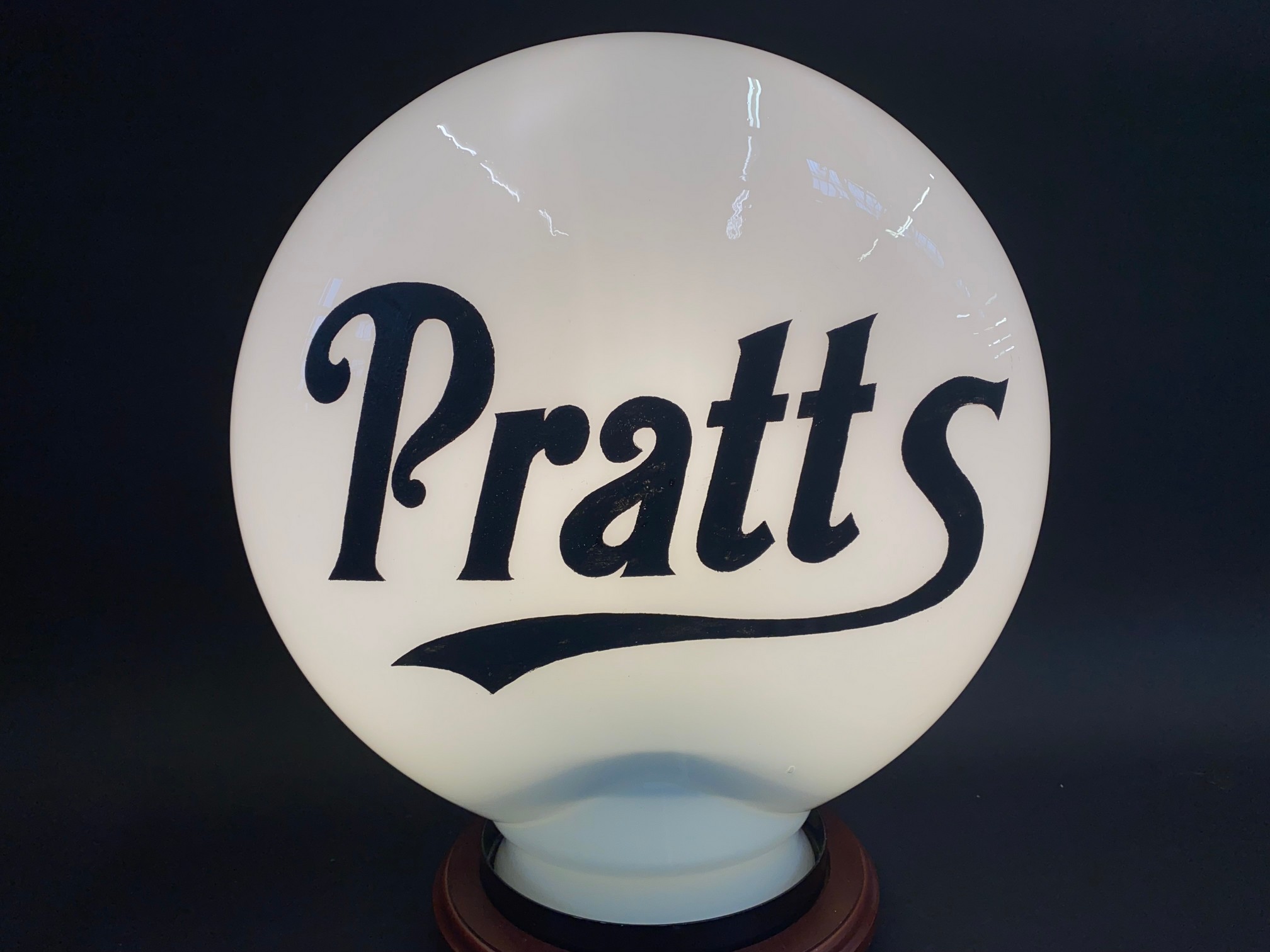 A rare and early Pratts pill-shaped glass petrol pump globe by Hailglass, fully stamped and