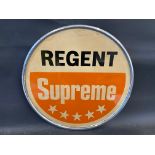 A Regent Supreme circular aluminium advertising garage sign, in very good condition, 18" diameter.