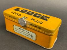 A Lodge 'Ford' spark plug in original tin of issue, still with seal, unopened.