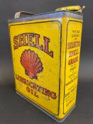 A Shell Lubricating Oil rectangular gallon can with original cap.
