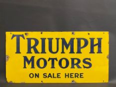 A Triumph Motors on sale here rectangular enamel sign in excellent condition, 30 x 15".