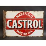 An early Wakefield Castrol Motor Oil double sided enamel sign with hanging flange, rare red and