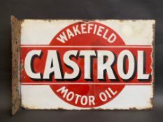 An early Wakefield Castrol Motor Oil double sided enamel sign with hanging flange, rare red and
