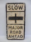 A reproduction 'Slow Major Road Ahead' rectangular aluminium road sign, 14 1/4 x 27 1/2".