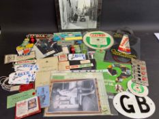 A collection of mixed motoring ephemera, some laminated, an RAC GB plate etc.