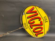 A Vigzol Oils oval double sided enamel sign in metal frame.
