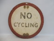A circular No Cycling sign, 18" diameter.