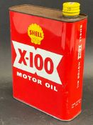 A red Shell X-100 Motor Oil can.