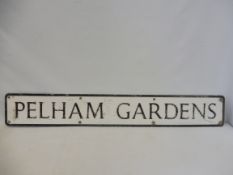 A street name sign for Pelham Gardens, 48 x 7".