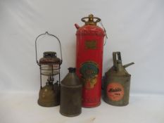 A Galvo fire extinguisher, a tilly lamp and two oil cans.