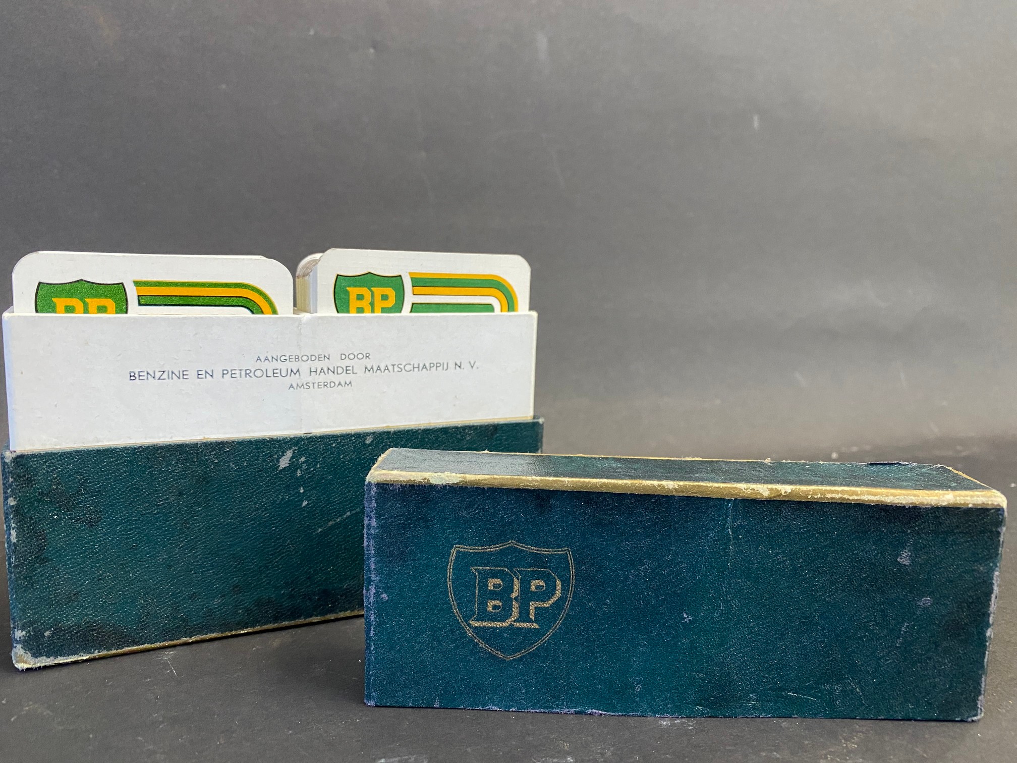 A near mint double set of BP playing cards.