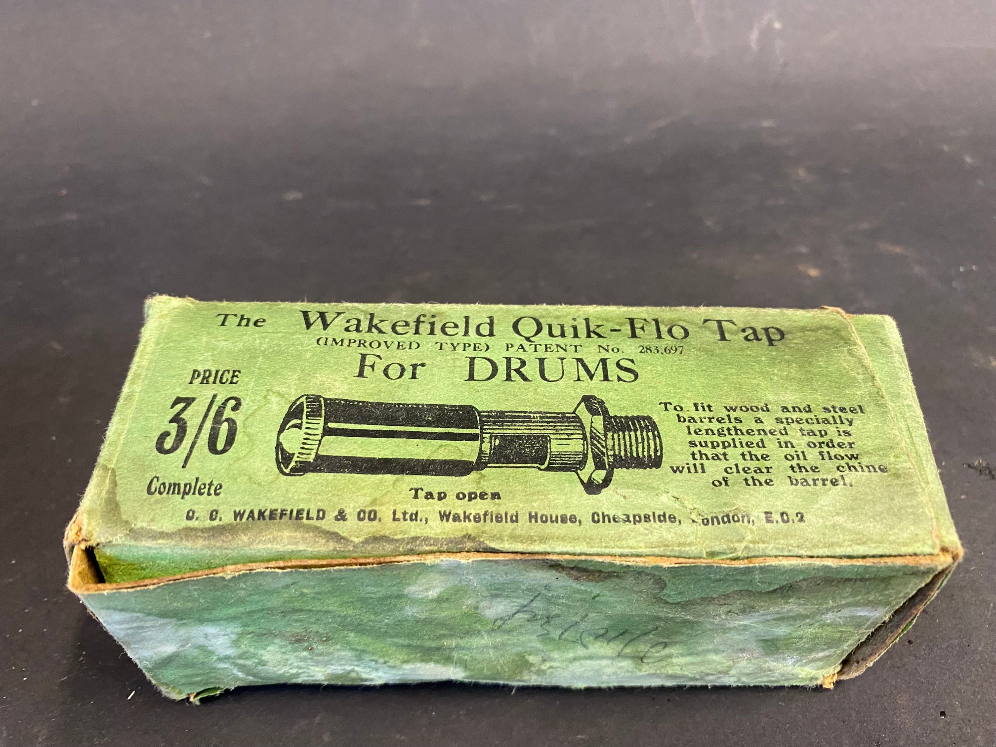 An early boxed Wakefield Quik-Flo tap for drums.
