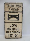 An aluminium road sign for Low Bridge Head Room, with raised glass reflective beads, 15 x 27".
