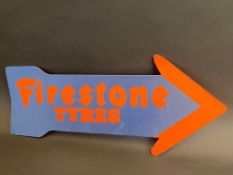 A Firestone Tyres directional double sided cardboard arrow, 23 1/2 x 10".