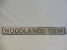 A street name sign for Woodlands View, 49 x 6".