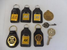 Six different AA keyrings, showing the evolution of the AA emblem, plus two early AA keys and a